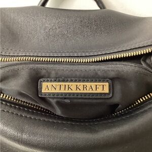 Antik Kraft Black Interior with Gold Accents